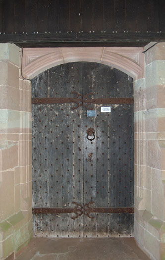External side of West Door. 17th century