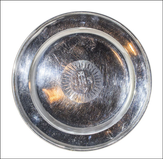 Silver Paten with central sunburst engraving